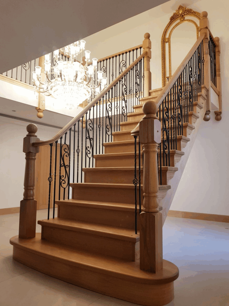 oak staircase with black metal spindles